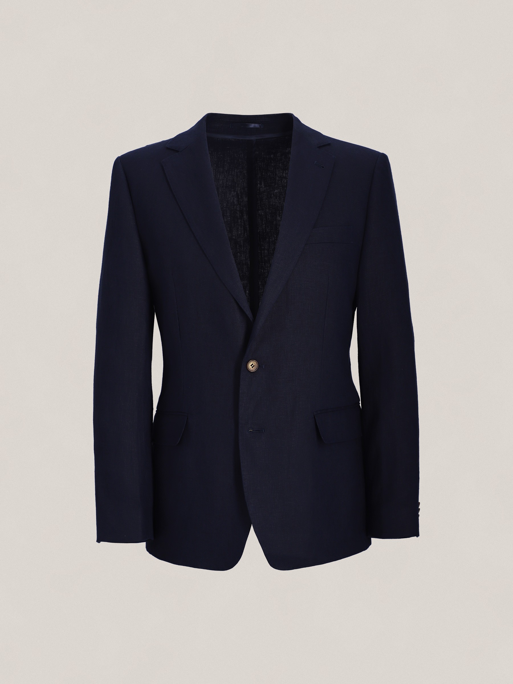 Graphic of a typography specimen showing the alphabet and numerals on top of a dark gray background.