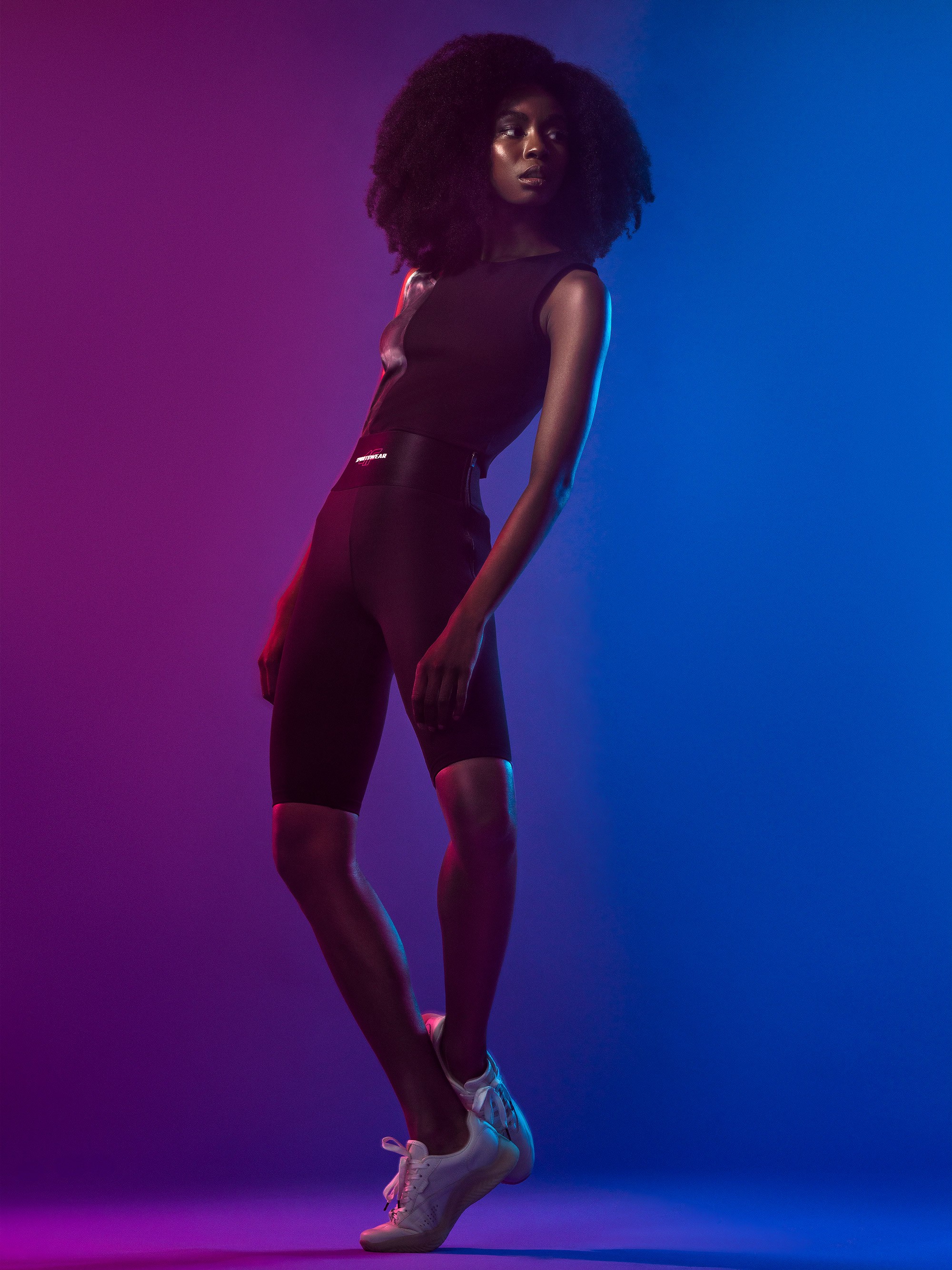 Graphic depicting a hexagonal cropped photo of an interior room design with grid lines along its borders.