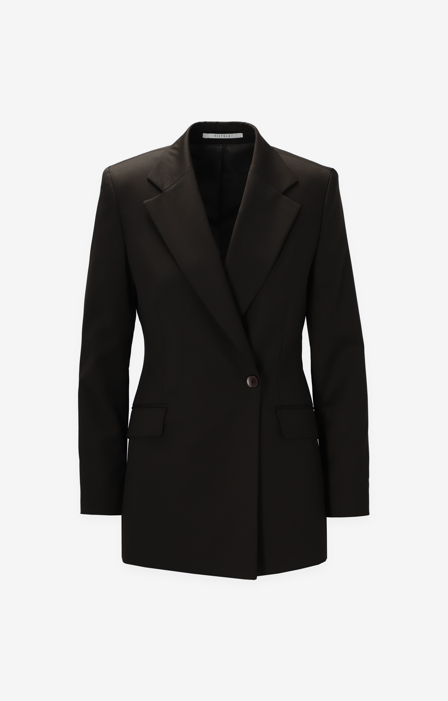 Graphic depicting a hexagonal cropped photo of an interior room design with grid lines along its borders.