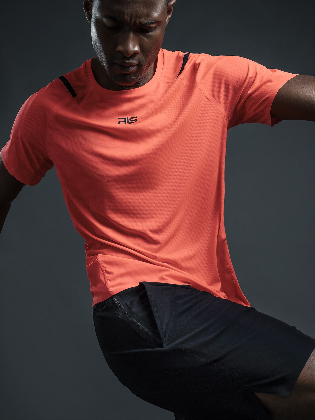 Graphic of a typography specimen showing the alphabet and numerals on top of a dark gray background.