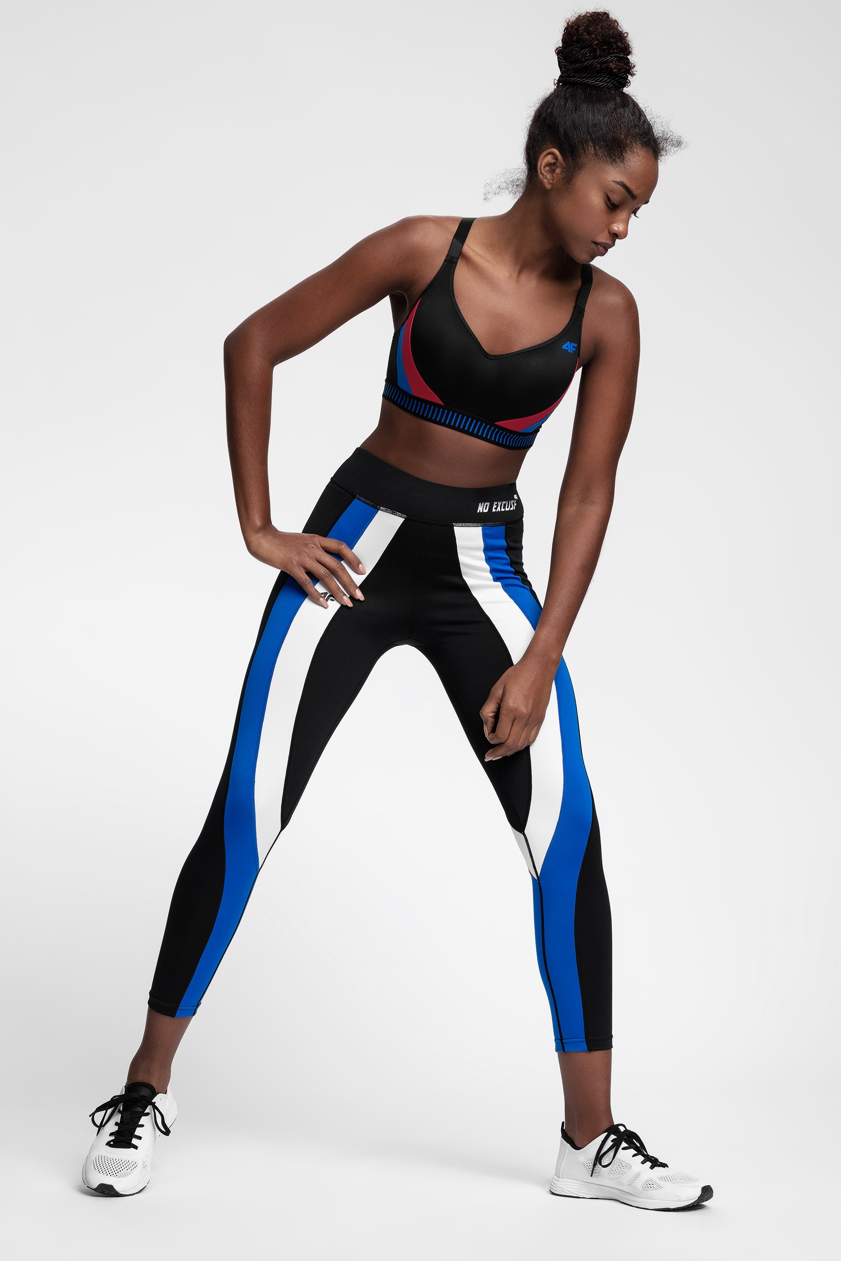 Graphic of a typography specimen showing the alphabet and numerals on top of a dark gray background.